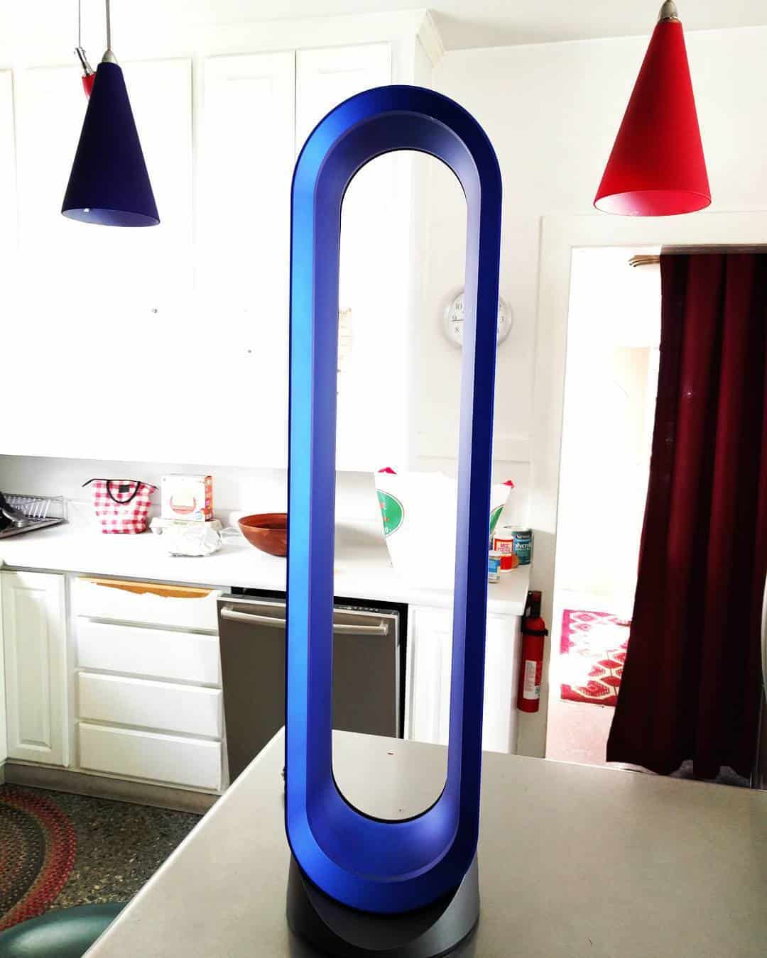Blue Dyson fan in a living room #towerFan #fan #fans #whatfans #dyson #homeDecor #interiorDesign #livingRoom